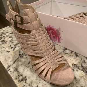 Never been worn, size 7.5 shoes